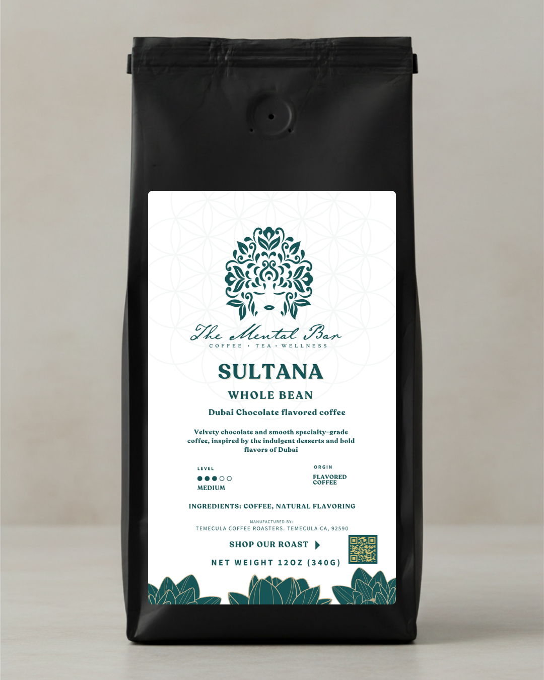 Coffee bag labeled 'Sultana' with a decorative design on a neutral background