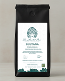 Coffee bag labeled 'Sultana' with a decorative design on a neutral background